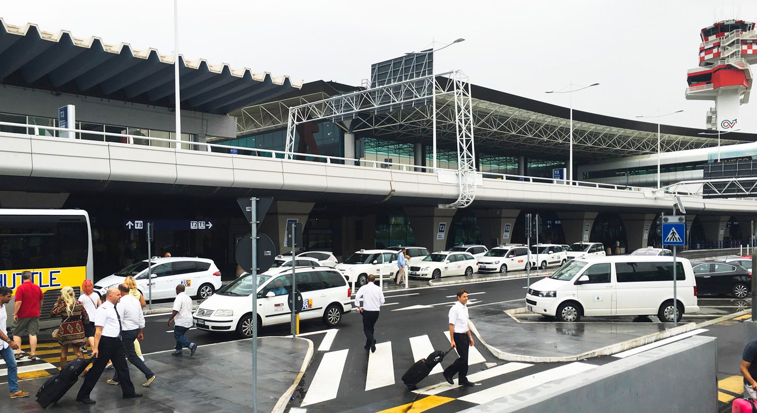 Fiumicino airport white taxi lined up
