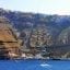 View of Santorini Old Port with the cliffs behind.