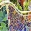 Close up of a colorful mosaic wall at a park in central Barcelona.