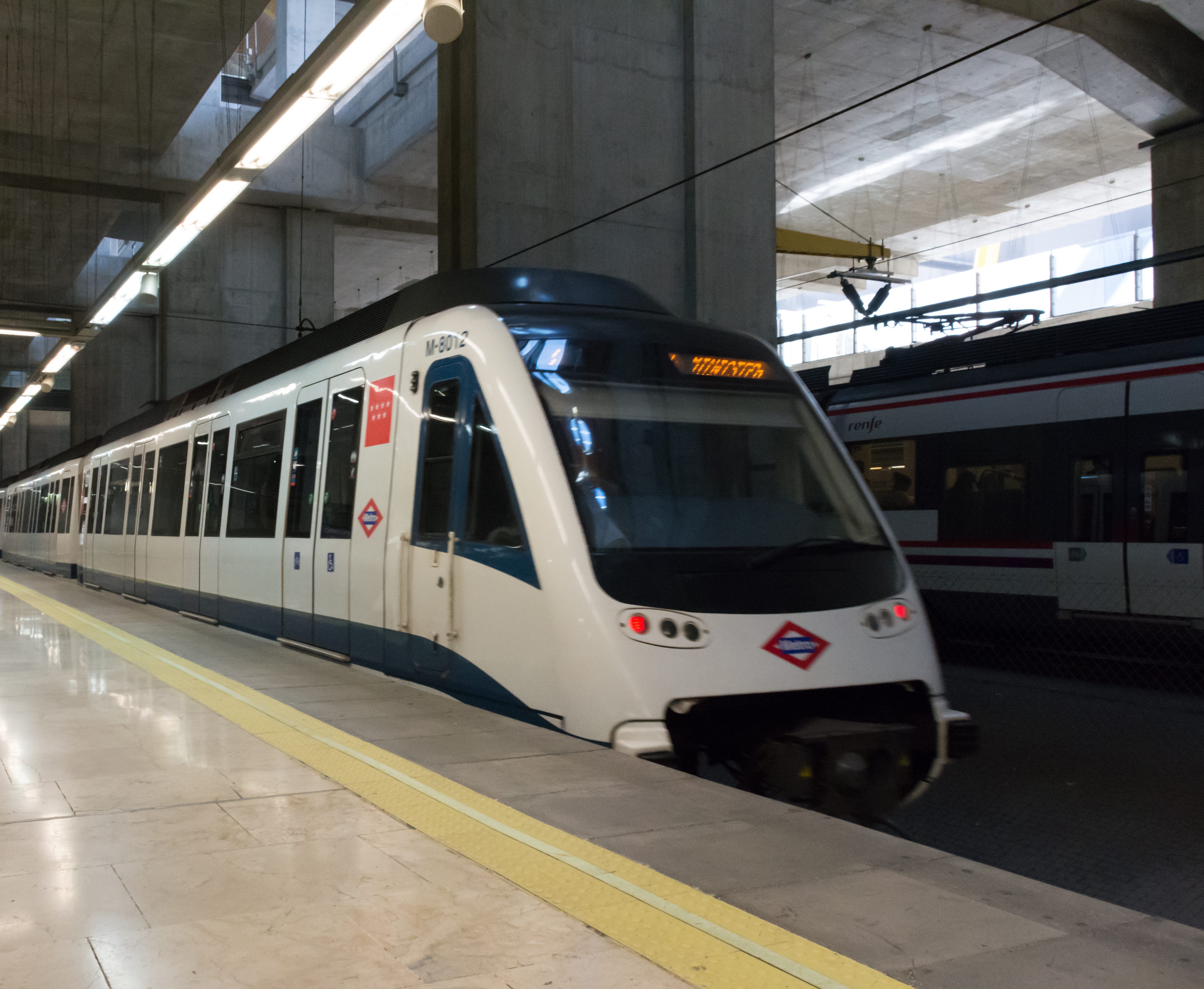 Madrid airport metro train arriving at the airport