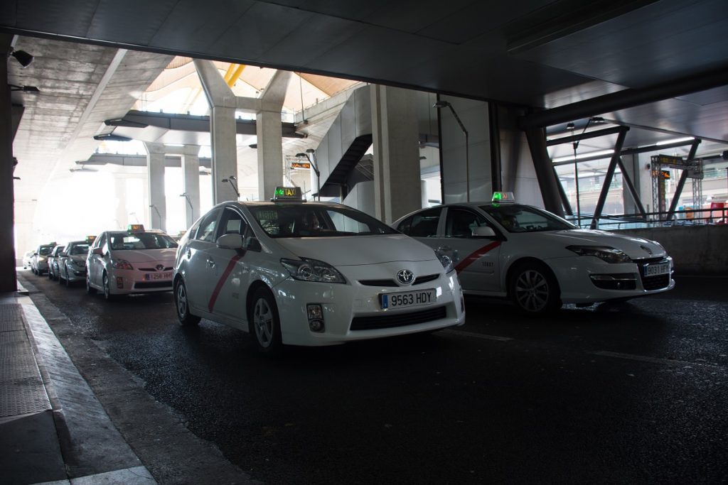 Madrid Airport white taxis lined up