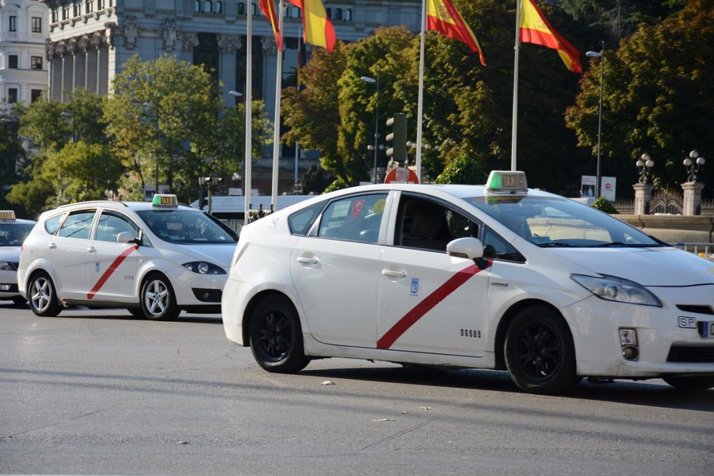 White Madrid Airport taxis arriving at the airport