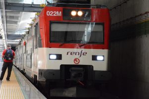 Madrid airport regional renfe train arriving at the platform