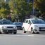 White Madrid white taxis driving on the street.