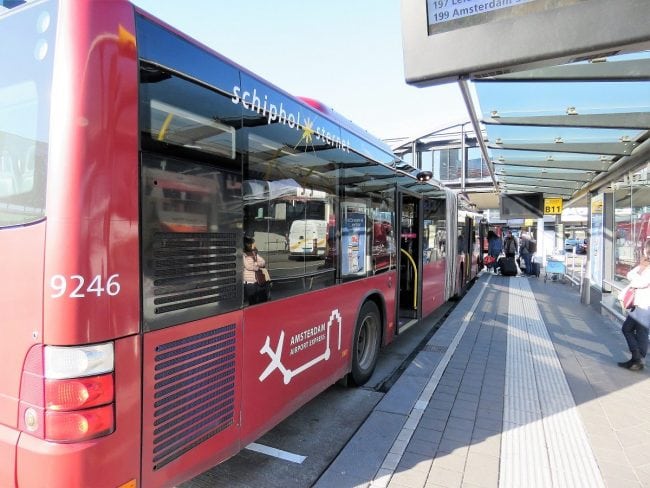 Connexxion's 197 Amsterdam Airport Express bus waiting on the platform
