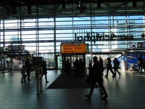 Amsterdam airport exit doors Directional signs on the airport's exit doors