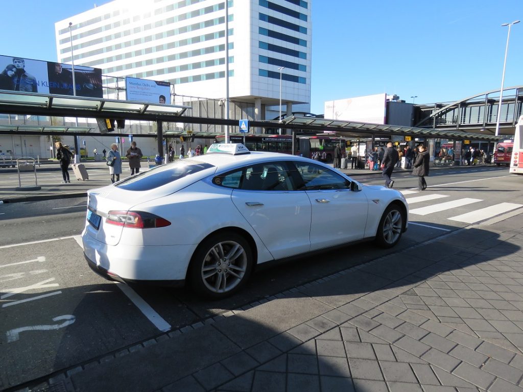 Amsterdam airport white taxi