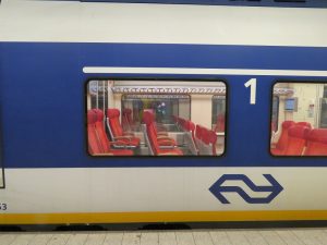 Amsterdam airport Intercity Direct train Amsterdam airport Intercity Direct train waiting on the platform and view of the interior design of a wagon