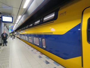 Amsterdam airport double-deck train Amsterdam airport double-deck train departing from the airport