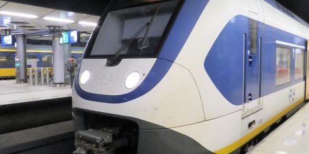 Amsterdam Airport train arriving at the platform