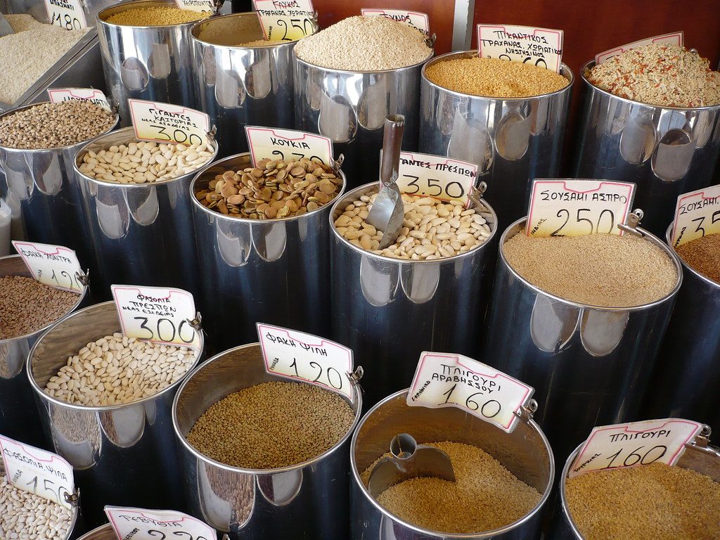thessaloniki market, buckets of spices and seeds.