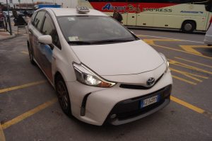 Bergamo Airport taxi - Welcome Pickups A white Bergamo Airport taxi