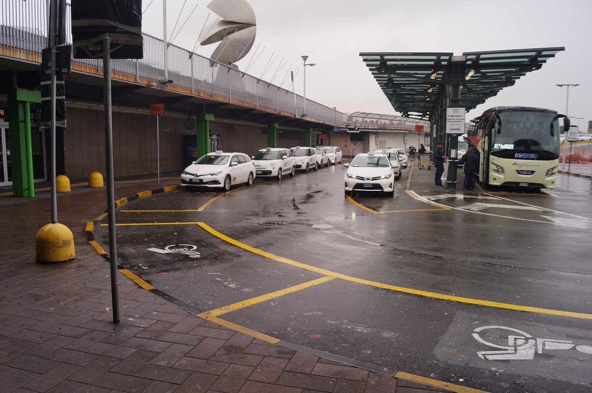 Milan Linate Airport taxi rank and bus stops where you can get your ride from Linate Airpot to Milan city center