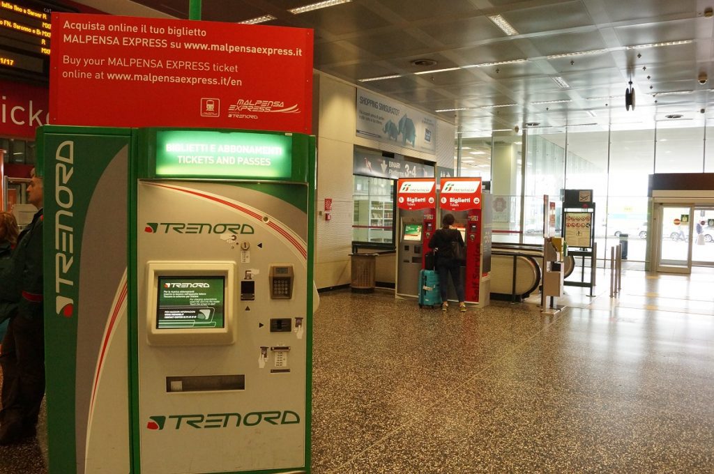 Milan airport Malpensa Express automated train ticket machine. Get your ticket for a trip from Milan Airport to the city center