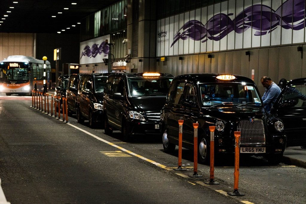 Heathrow black airport taxis lined up