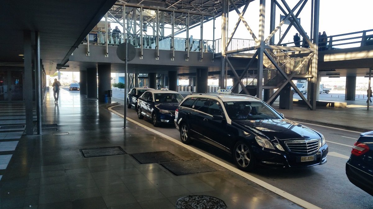 Macedonia airport blue taxis on the line