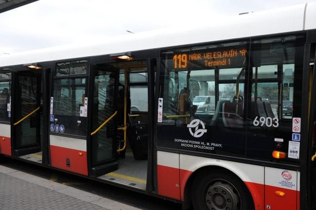 Prague Airport public bus No. 119 Side view of public bus No. 119 with its doors open.
