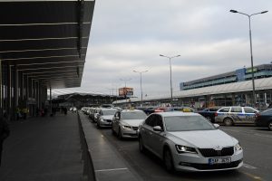 Prague airport white taxis lined up