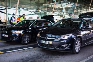 Lisbon airport black taxis lined up and waiting for passengers. Take a taxi from lisbon airport to cascais and start exploring.