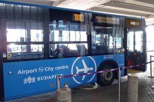 Public bus No. 100E Public bus No. 100E waiting on the airport's platform. The bus from Budapest Airport to Keleti train station is a great, budget- friendly option.