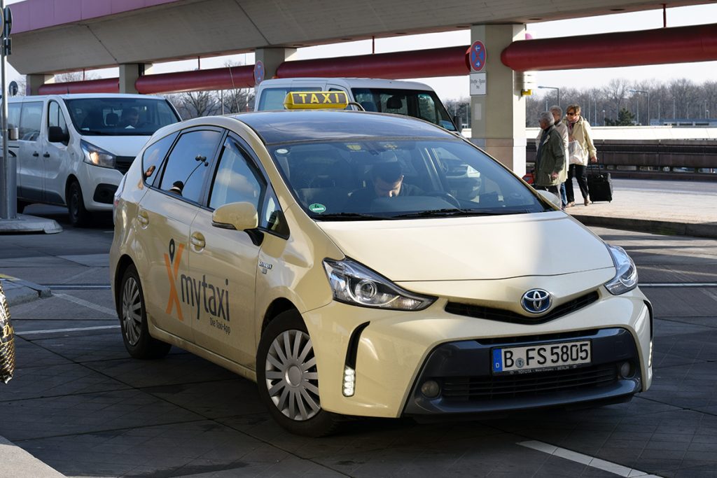 Berlin airport cream-colored taxi