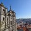 A view of an old, ornamental building looking out over the city of Porto.