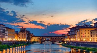 Sunset over the The Ponte Vecchio bridge in Florence