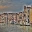 View of colourful houses lining the banks of central canal of Venice.