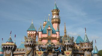 the Disneyland Paris castle under a blue sky