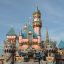 the Disneyland Paris castle under a blue sky