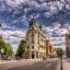 Toulouse city streets under a cloudy sky.
