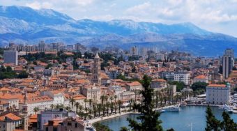 Split city with mountains in the background