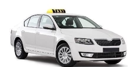 alicante taxi white taxi with yellow roof sign