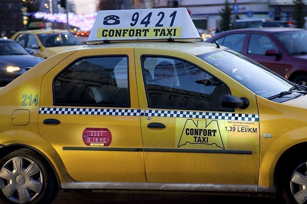 Taxi price. Такси Берлин. Такси в Латвии. Дверь такси. Такси в Бухаресте.