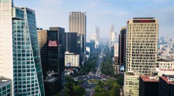 A view of Mexico City with several high-rise buildings.