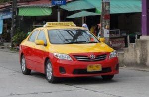 red and orange taxi in phuket thailand