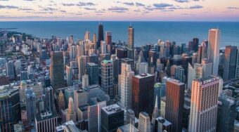 An aerial view of Downtown Chicago filled with skyrise buildings.