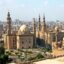 City scape in Cairo under a hazy daylit sky.