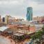A view of Downtown Dallas with sky rise buildings.