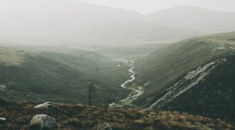 Barren land pictured on a foggy day