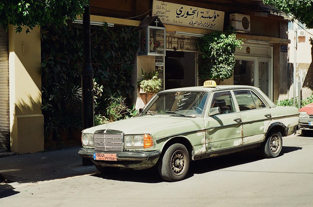 Beirut taxi classic Beirut taxi in pistachio green with a signature yellow sign on the roof