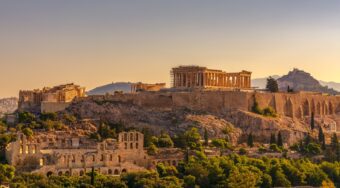 View of Acropolis of Athens with Parthenon and Erechtheion from Filopappou hill. Herodium, Lycabettus and Acropolis of Athens view from Filopappou hill a summer sunny day
