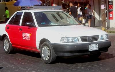 mazatlan taxi white and red taxi vehicle