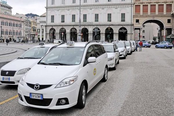Turin Taxi Official white taxis in Turin lined up in the city