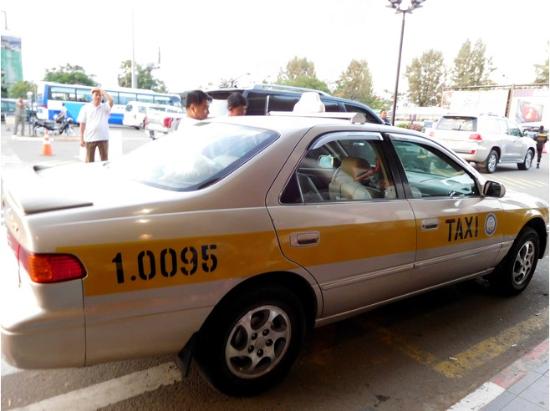 Phnom Penh Taxi Official white and yellow taxi in Phnom Penh, Cambodia