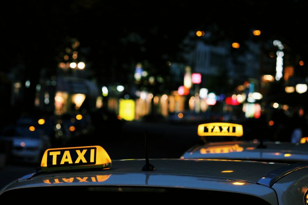 Lit taxi signs in Orlando at night