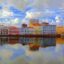 The colorful buildings of Recife Old Town reflected in the Capibaribe River.