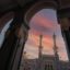 sunset seen through an archway