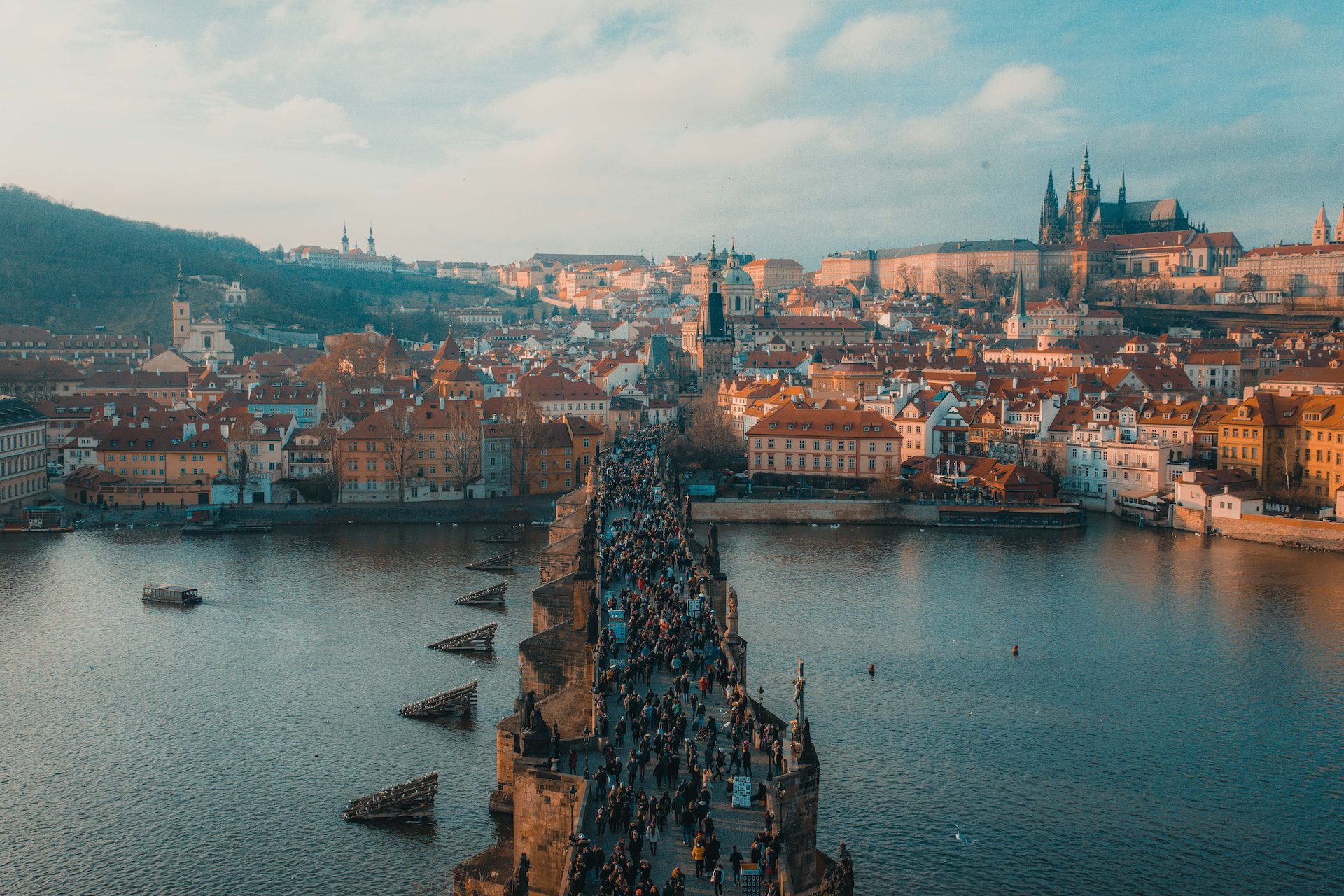 Panoramic view from Charles Bridge tower, overlooking the Vtlava River and central Prague.