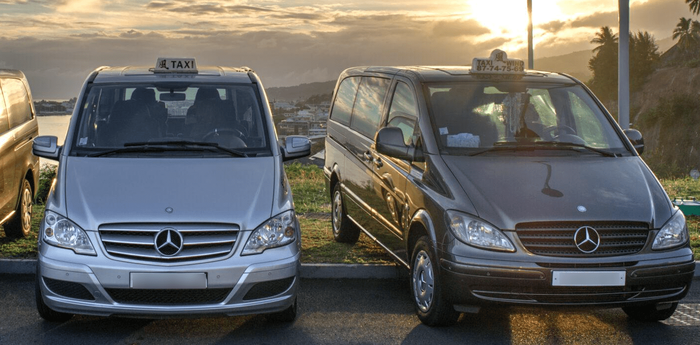 Tahiti Taxi Tahiti Taxi - Picture of 2 minivan taxis in Tahiti